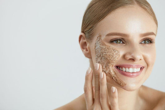 Woman exfoliating at home